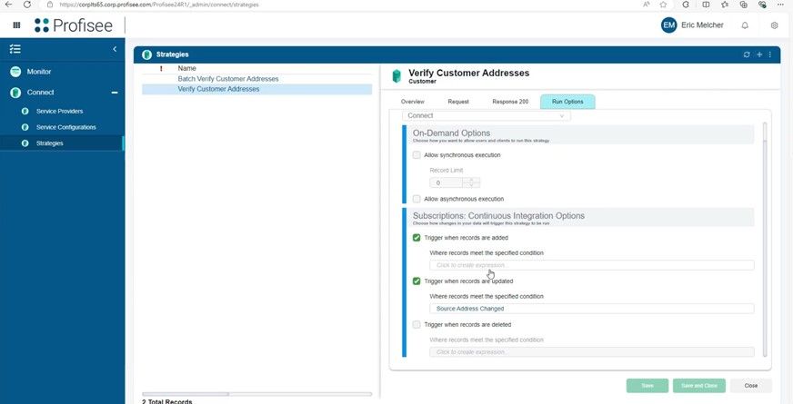 A computer screen displays the Profisee platform with the "Verify Customer Addresses" strategy settings and options for triggering address validation in the latest Profisee release.