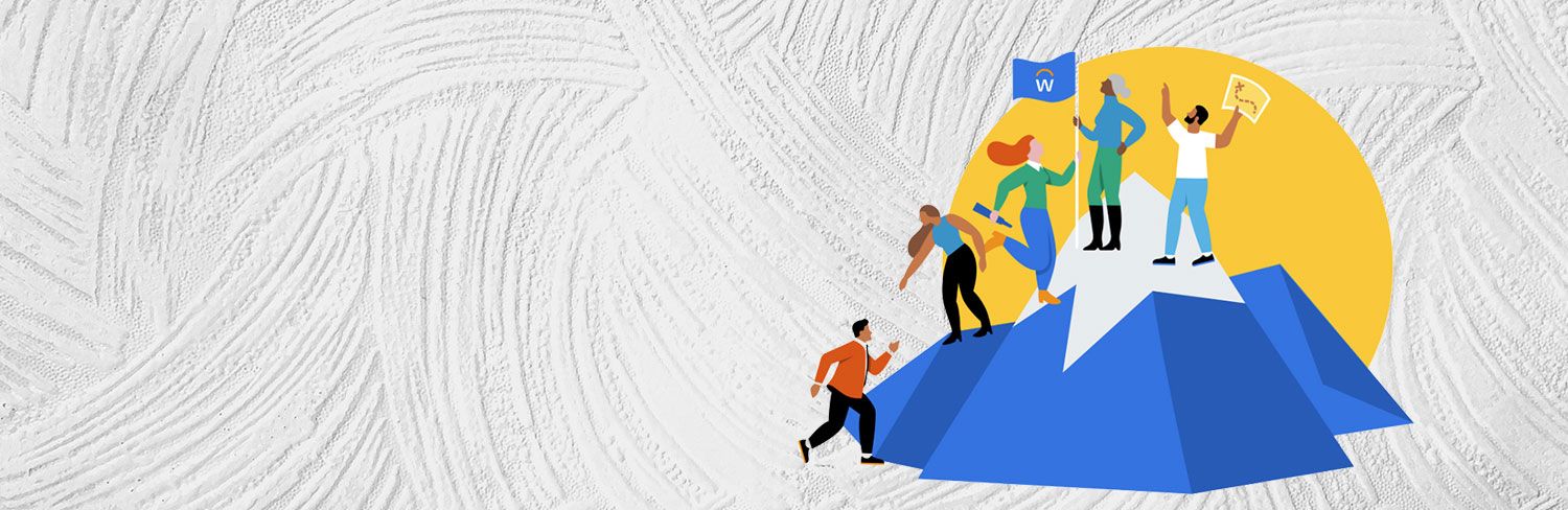 a group of people walking up a mountain