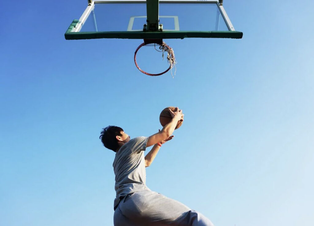 Sports image of basketball dunk