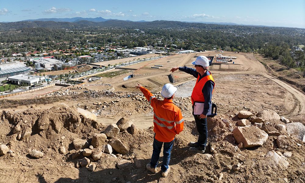 Douglas Partners, surveyors on a hill