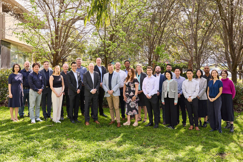 QMetrix_team-group-photo-outside